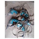 pile of makita corded tools