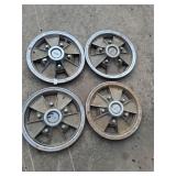 set of 4 steel hub caps chevy