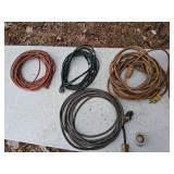 4 extension cords in a crate