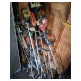corner full of strig trimmers, for parts repair