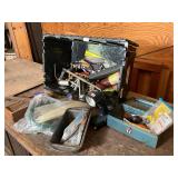 Black tote of assorted tools and miscellaneous