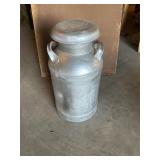 Milk can with top- small rust holes bottom