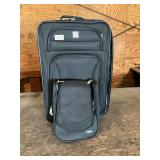 Protï¿½gï¿½, black rolling suitcase