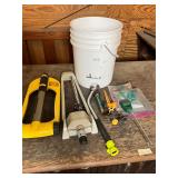 5 gallon bucket and water sprinklers lot