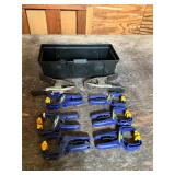 Black and yellow toolbox and Irwin clamps