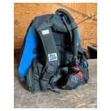 The dive shop BCD- it does inflate size Md