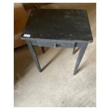 Black wooden table with drawer