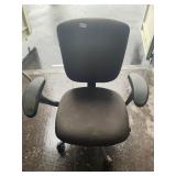 Black rolling adjustable office chair