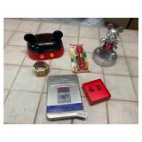 Mickey dvds, dancing statue, napkin holder- all