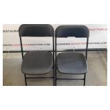 2 Black Plastic Folding Chairs