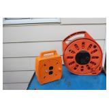 Two Wind Up Extension Cords with Electrical Outlet
