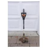 The Worx 20V Cordless Trimmer w Battery & Charger