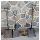 Various Styles of Shovels and a Sledge Hammer