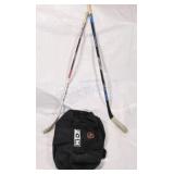 CCm Hockey Bag w LEFT Hockey Sticks