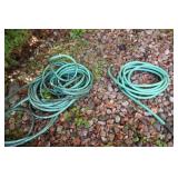 Two Green Garden Hoses