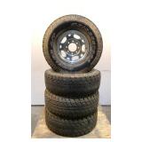 (4) Bridgestone 8 Lug 16" Wheels w/ Tires