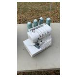 Sewing Machine With Thread-