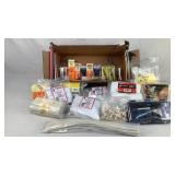 Box of assorted gun cleaning accessories