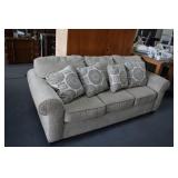 Sofa w/ 4 Pillows (smoke damage)