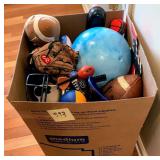 Large box of balls, helmets, sports