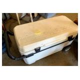 Large white Igloo cooler with handle and wheels