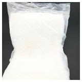White Quilted Pillow in Plastic Wrap