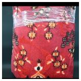 Red Patterned Rug Roll