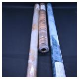 Assortment of Decorative Wallpaper Rolls
