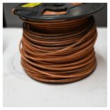 Spool of Orange Copper Electrical Wire