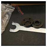 Metal Wrench with Two Black Fittings