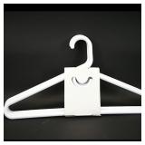 Set of White Plastic Hangers