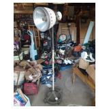 VINTAGE CAST IRON BASE ROLL AROUND HEATER