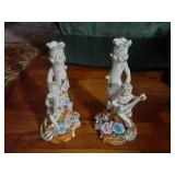PAIR OF OLD PORCELAIN CHERUB CANDLESTICK HOLDERS