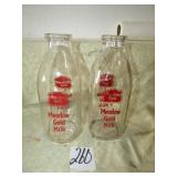2- MEADOW GOLD QT. MILK BOTTLES