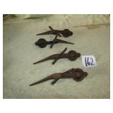 4- CAST IRON CORN SHOCK TIES