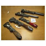 5- SOLID BAR ADJUSTABLE MONKEY WRENCHES- COE'S.
