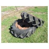 PAIR 10:00-24 TIRES ON 8 BOLT RIMS