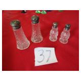 2- CLEAR SALT / PEPPER SHAKERS W/ STERLING TOPS
