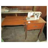 DRESSMAKER SEWING MACHINE IN MAPLE CABINET
