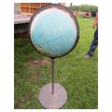 WORLD'S GLOBE ON CAST IRON BASE STAND