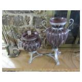 2- PURPLE GLASS VASES IN WROUGHT IRON STAND