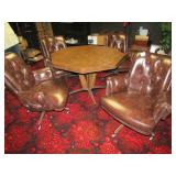 MID CENTURY TABLE W/ 6 LEATHER ROLL AROUND CHAIRS