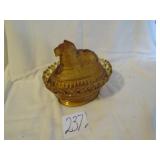 AMBER LION ON NEST W/ OPEN LACE