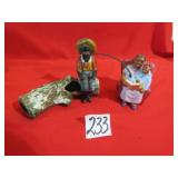 EARLY POTTERY LITTLE BOY SITTING ON LOG FISHING;
