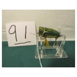 UNKNOWN WOODEN GREEN & BLACK W/ YELLOW SPOTS