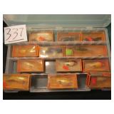 12- BOMBER LURES, 4- W/ ORIGINAL PFG. IN A PLASTI