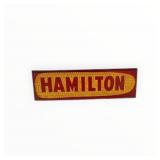 Hamilton Seed Painted Metal Spinner Sign