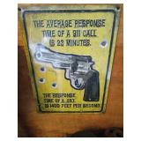 Metal Sign with Gun Design
