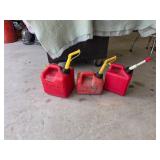Three Red Gasoline Cans