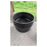 Stacked Black Plastic Tubs